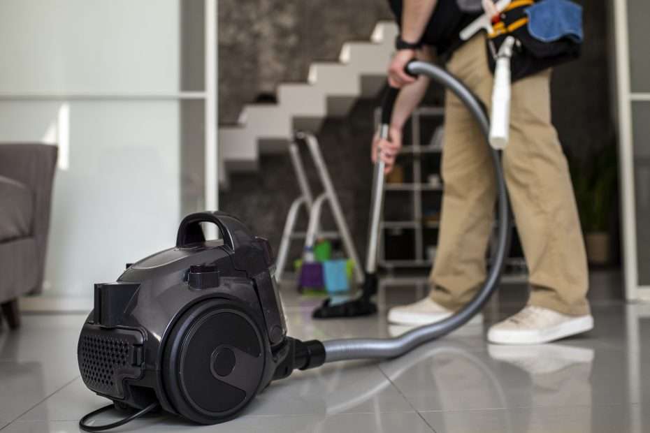 man doing professional home cleaning service